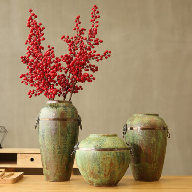 Vintage ceramic vase with antique copper ring