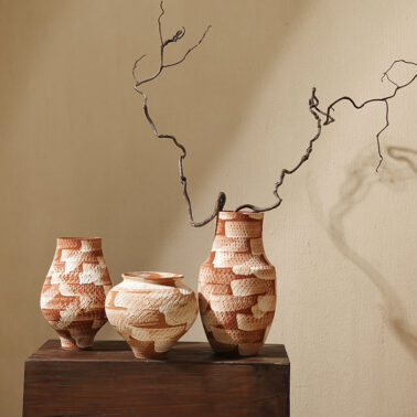 Handmade ceramic vase with horizontal knife pattern