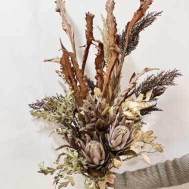 Artificial dried flower foliage, sorghum, imperial orchid leaves, and oak leaves with burnt edges.